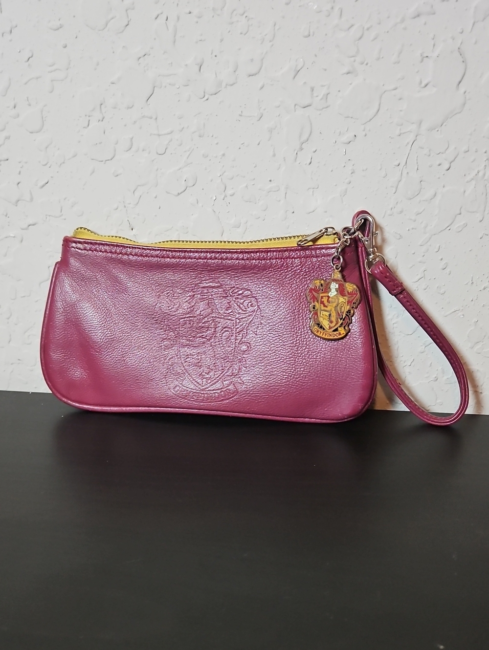 Harry Potter Universal Wristlet with Embossed Detail And Charm